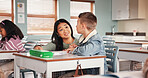 Classroom, child and teacher for education help, school and learning for assignment in junior grade. Quiz, question and boy with knowledge test, scholarship and development to prepare in academy
