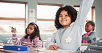 Girl, children and raised hand in classroom, smile and excited for answer, quiz and development at school. Kids, pupil and happy for solution, question and test for education with learning at academy