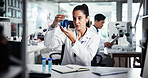 Woman, scientist and beaker with chemical compound for medical research, exam or test results at lab. Female person, science or liquid sample for scientific trial, chemistry experiment or new study