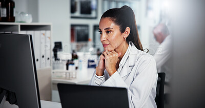 Buy stock photo Computer, scientist and thinking with woman in laboratory for healthcare, medical research or innovation. Technology, analysis or study with biologist in clinical trial for pharmaceutical development