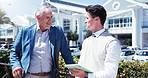 Businessmen, travel and destination with tablet in city for tour guide, career journey or app. Men, tourist and assistant with technology for business opportunity, commute arrangement or accomodation