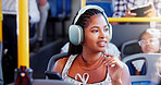 Happy woman, phone and bus with headphones for music, travel or destination in public transport. Female person, tourist or traveler with smile on mobile smartphone for audio app, sound or tour guide