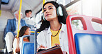 Headphones, journaling and woman on bus for travel with diary for planning, schedule or notes for university. Writing, tech and person on public transport listening to music with notebook for college