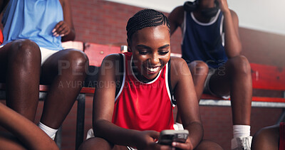 Buy stock photo Phone, smile and search with black woman on basketball court for sports progress, athlete scouting and contact. Score tracking, training program and hoop metrics with person and game updates