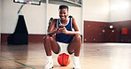 Smile, basketball or black woman with phone in gym on social media on break in college game. Court, happy and African girl athlete with mobile app for workout, sports scholarship or fitness training