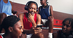 Phone, online and headphones with black woman on basketball court for sports progress, athlete scouting and streaming. Score tracking, training program and subscription with person and game updates