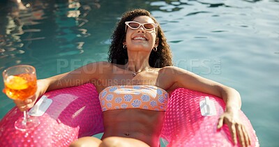 Buy stock photo Cocktail, woman and swimming pool with inflatable and smile for summer holiday or vacation. Travel, resort and drink by water for outdoor luxury, hotel hospitality and person to relax or chill