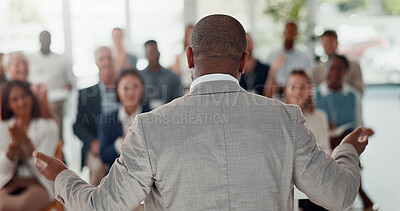 Buy stock photo Presentation, office and back of speaker with business people for conference, training or meeting. Corporate manager, discussion and workers in workshop, convention and seminar for financial planning
