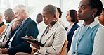 Tablet, conference and business woman in audience for seminar schedule, economic forum and meeting. Finance seminar, market research report and tradeshow event with people at convention expo