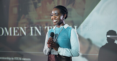 Buy stock photo Business, speech and black woman at convention for motivation at tech seminar with mic. Conference, presentation and happy keynote speaker at event for advice, empowerment or equality with programmer