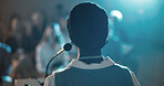 Business woman, speaker and podium for audience, presentation and seminar for start up conference or convention. Female person, back and microphone for international trade show, event or training