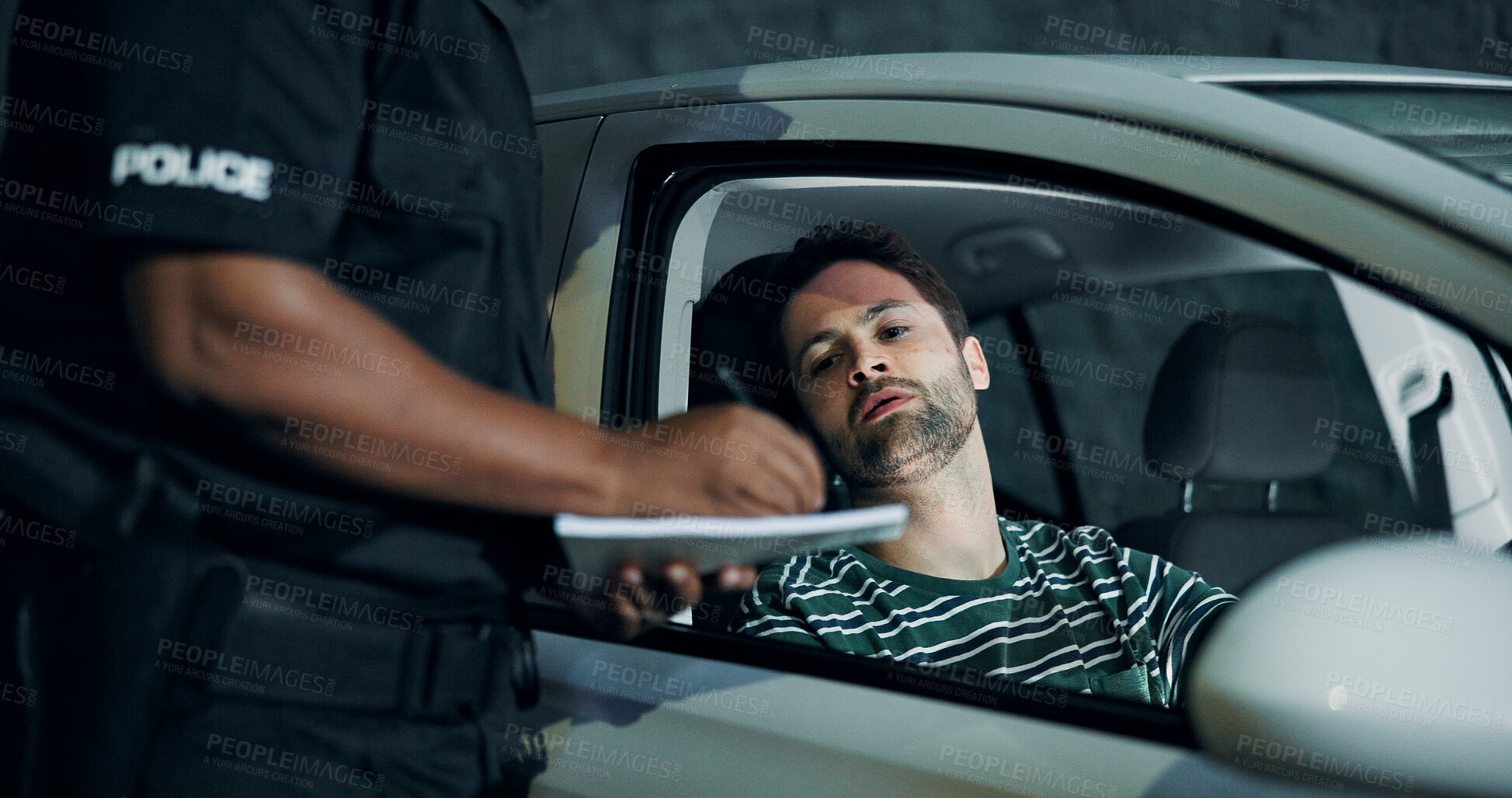 Buy stock photo Man, police and writing fine for car, registration and speeding with traffic warning. Person, law enforcement and licence for drunk driving, penalty ticket and transport risk with violation at night