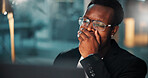 Black man, tired and night with yawn, computer and burnout for evening deadline at office desk. African editor, exhausted employee and working late on PC in fatigue, overworked or sleepy with project