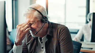 Buy stock photo Senior man, headache and stress at call center with pressure, frustrated and exhausted with burnout at agency. Person, consultant and migraine with fatigue, pain and voip mic for contact us in office