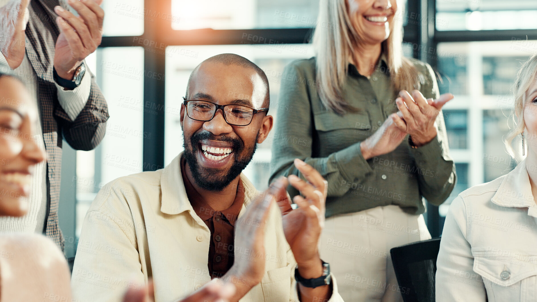 Buy stock photo Man, applause and smile at meeting in office with team, goals and support with celebration at startup. Business people, cheers and success with achievement, profit and excited at creative agency