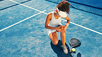 Sports, knee pain and woman on tennis court with injury, medical crisis and accident outdoors. Fitness, health and person with ache, strain and hurt from training, workout and exercise for padel game