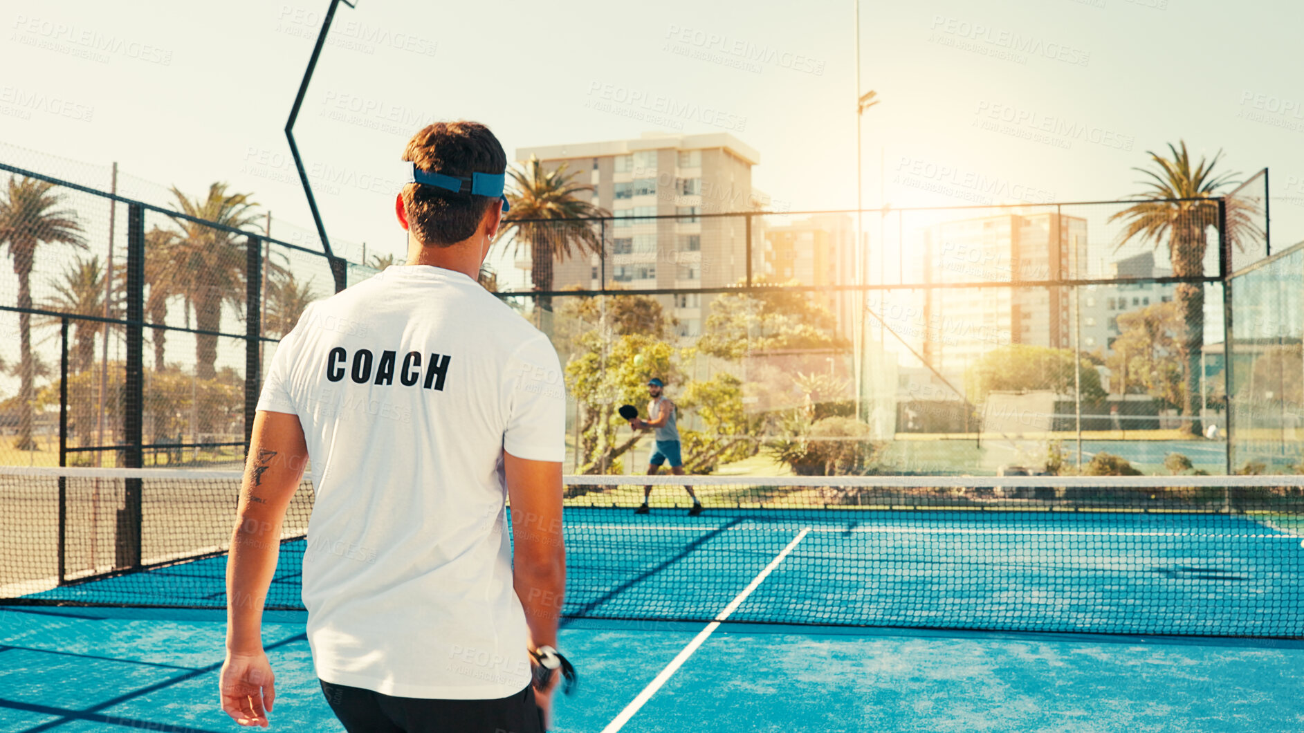 Buy stock photo Back, coach and man with training, tennis and lesson with fitness, workout and hobby. Professional trainer, instructor or athlete with court, practice or technique development with exercise or health