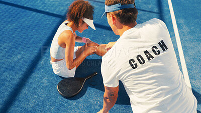 Buy stock photo Woman, sport and knee injury with coach for pain, medical assistance or help on outdoor court. Female person, paddle tennis or player with sore leg, bruise or joint inflammation for muscle sprain