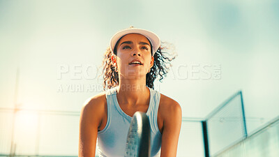 Buy stock photo Skills, athlete and woman with padel racket, outdoor and serious for performance with fitness and below. Court, player and person with equipment for practice, workout and training for competition