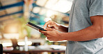Typing, college and hands of man with tablet for online research, website and internet course. University, library and student scroll on digital tech for education, learning and knowledge at campus
