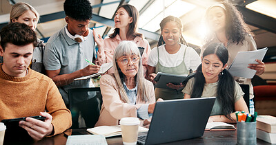 Buy stock photo Education, students and lecturer with laptop, explaining and info for assignment in classroom and group. Knowledge, teacher and mature woman with advice for project, people and planning in university