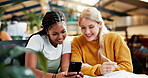 Smile, people and students with phone in library for social media, university gossip and good news. Happy, friends and mobile for reading information, education agenda and learning website at college