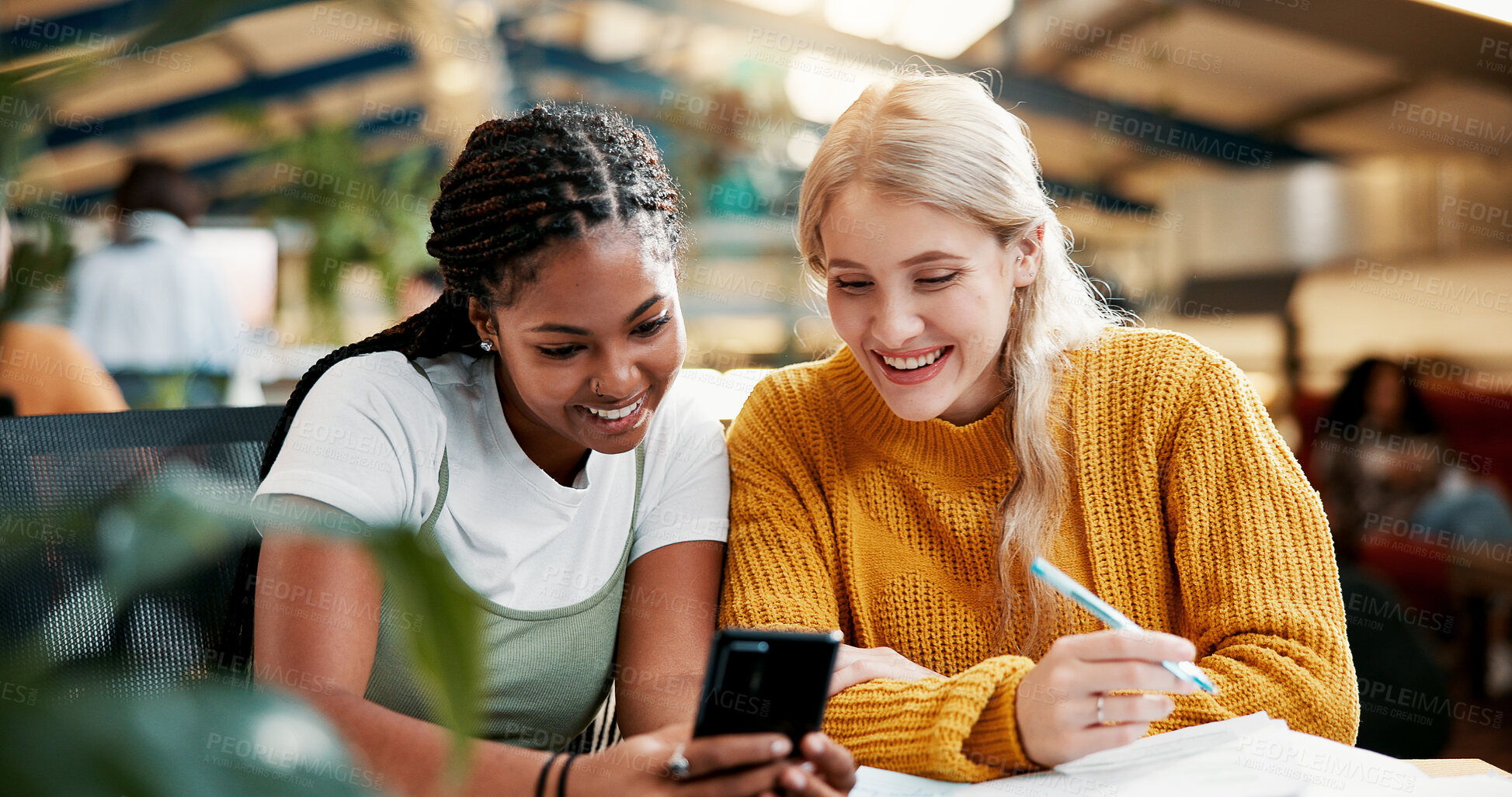 Buy stock photo Smile, people and students with phone in library for social media, university gossip and good news. Happy, friends and mobile for reading information, education agenda and learning website at college