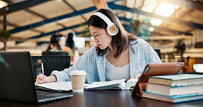 Buy stock photo Headphones, writing notes and woman learning in university for knowledge, research or listening to audio. Book, college and serious student study for exam, education or test with technology for music