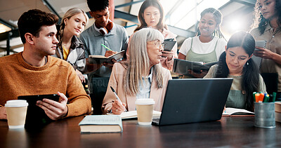 Buy stock photo Education, students and lecturer with laptop, discussion and info for assignment in classroom and group. Knowledge, teacher and mature woman with advice for project, people and planning in university