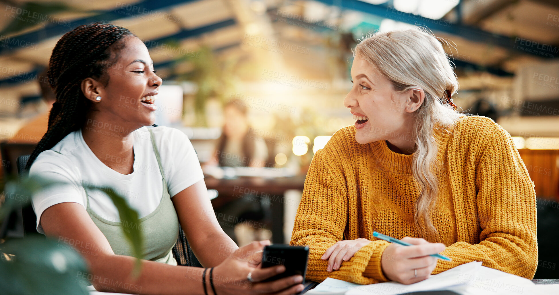 Buy stock photo People, friends and laugh with phone in library for social media, university gossip and funny joke. Smile, students and mobile app for streaming video, learning website and online rumor for knowledge