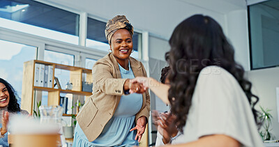Buy stock photo Business woman, meeting and introduction with handshake at office for onboarding or greeting. Female people, employees or shaking hands with smile for partnership, thank you or agreement at workplace