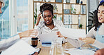 Woman, headache and meeting with documents at startup for proposal, review or tired with fatigue in boardroom. Person, group and team with paperwork, migraine and pain with burnout at creative agency