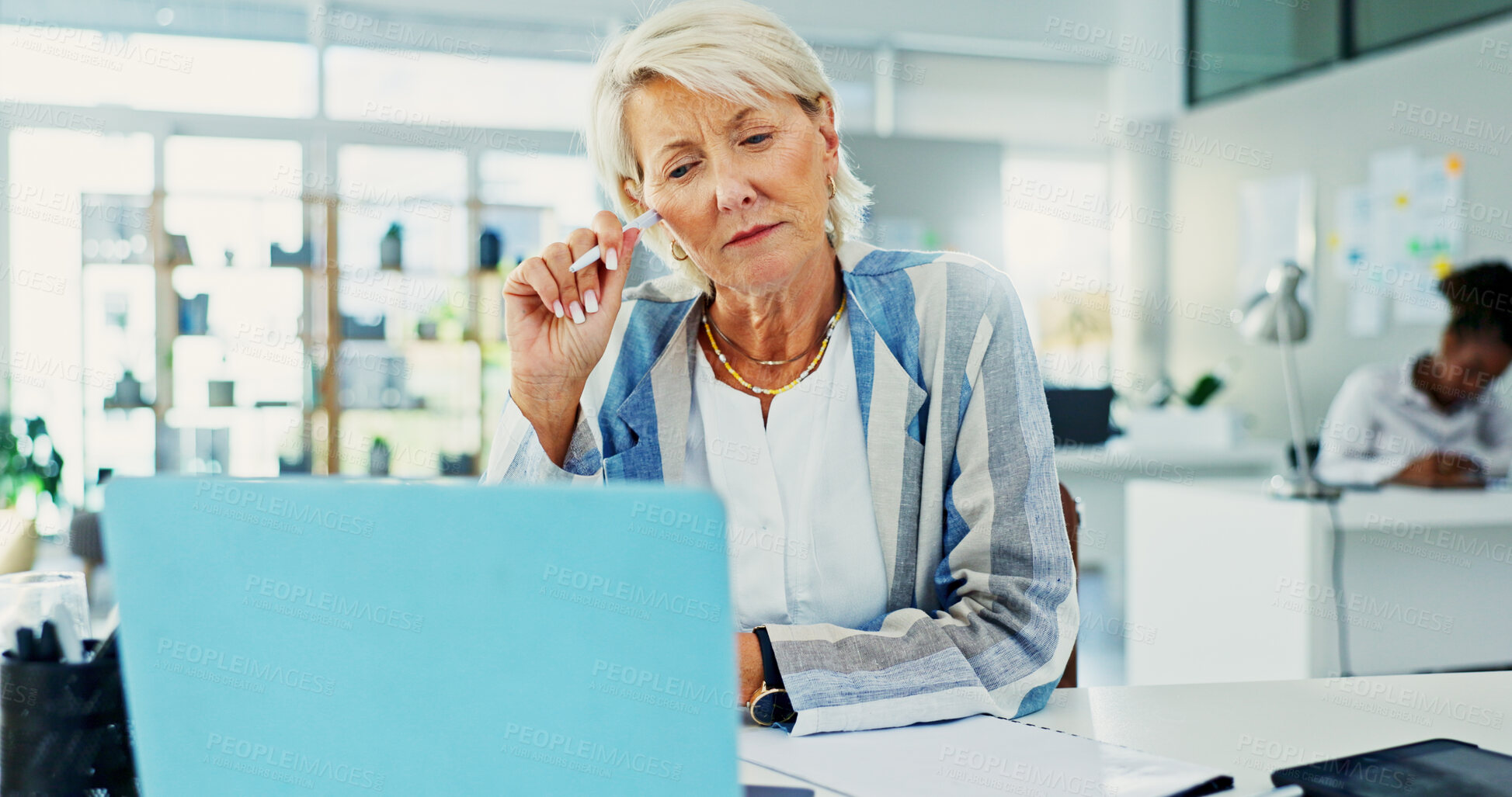 Buy stock photo Doubt, laptop and business woman in office with thinking for stock market feedback. Computer, ideas and mature female financial manager confused with email for investment planning in workplace.