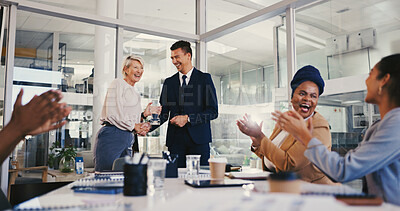 Buy stock photo Applause, success and award with business people in meeting for trophy, achievement and deal. Promotion, congratulation and handshake with group of employees in office for profit, bonus and winner