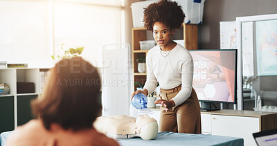 Buy stock photo Teaching, cpr and woman with mask, dummy and lesson to help in emergency, healthcare and demonstration. Course, people and instructor with ventilator for mannequin, breathing and oxygen in class