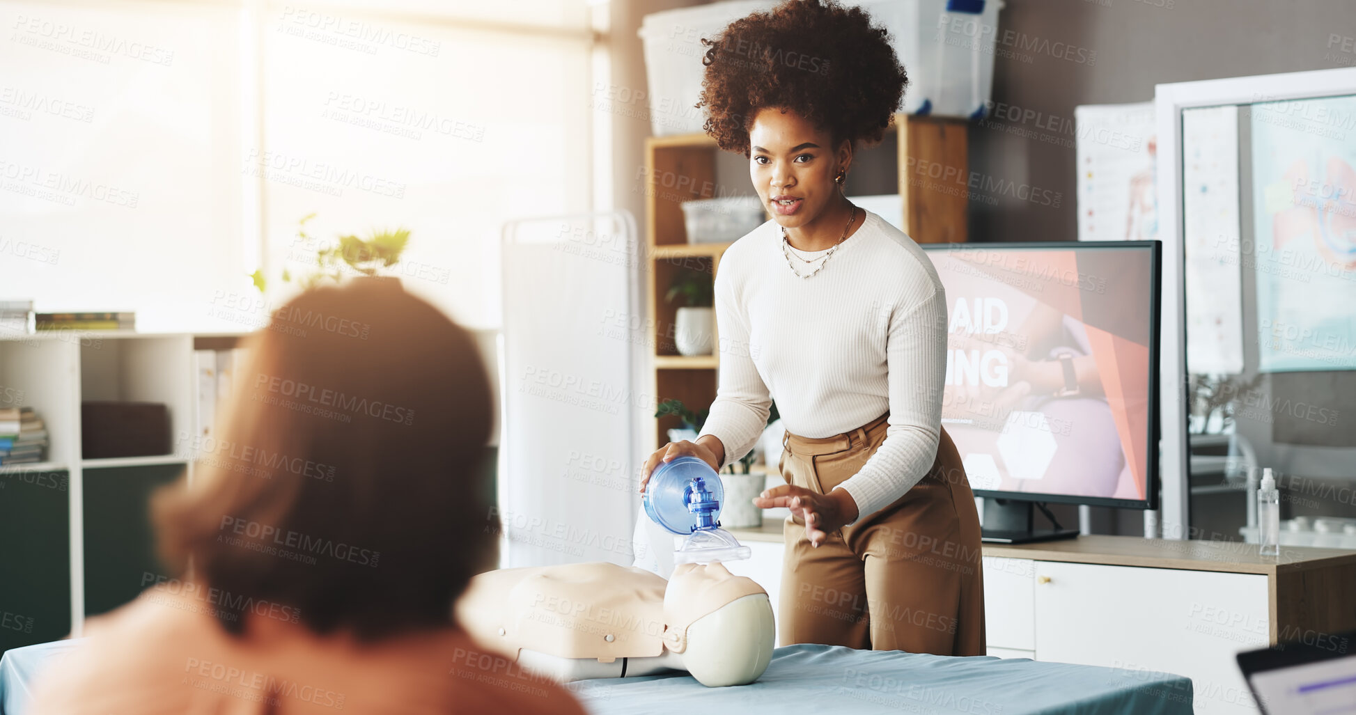Buy stock photo Teaching, cpr and woman with mask, dummy and lesson to help in emergency, healthcare and demonstration. Course, people and instructor with ventilator for mannequin, breathing and oxygen in class