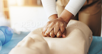 Buy stock photo Hands, person and teaching cpr with dummy with demonstration, compression and breathing safety. Woman, mannequin and ventilation process for medical emergency, healthcare protocol and technique steps
