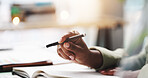 Pen, hand and person with notebook in home for studying with university test, exam or assignment. Stationary, closeup and student writing notes for research on college scholarship  application.