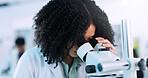 Microscope, woman and scientist in laboratory with studying cell function for RNA development. Biotech, medical research and geneticist with equipment for DNA vaccine, pharmaceutical or immunology.