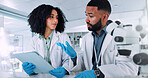 People, scientist or team with tablet for research, new study or scientific data at laboratory. Man, woman or science employees with technology for forensic results, analysis or medical development