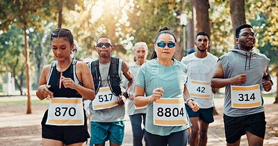Buy stock photo Running, marathon and fitness with people in park for charity event, race challenge and health. Training, fundraising competition and exercise with runners in nature for performance and sports