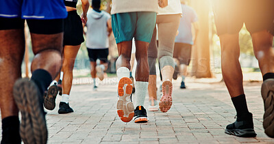 Buy stock photo Running, fitness and shoes of people in park for workout, marathon challenge and race. Training, speed competition and exercise with closeup of runners feet on ground for performance and sports