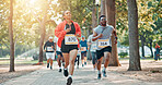 Running, marathon and speed with people in park for charity event, health challenge and fitness. Training, fundraising competition and exercise with group of runners in nature for workout and sports