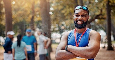 Buy stock photo Smile, athlete and man with arms crossed, marathon and confident for wellness in competition and portrait. Sports, runner and person with fitness for race, happiness and healthy body in morning