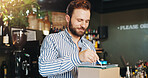 Coffee shop, pen and man on tablet with boxes in cafe for menu items, inventory and online order. Restaurant, hospitality and business owner on digital tech for internet, planning and checklist