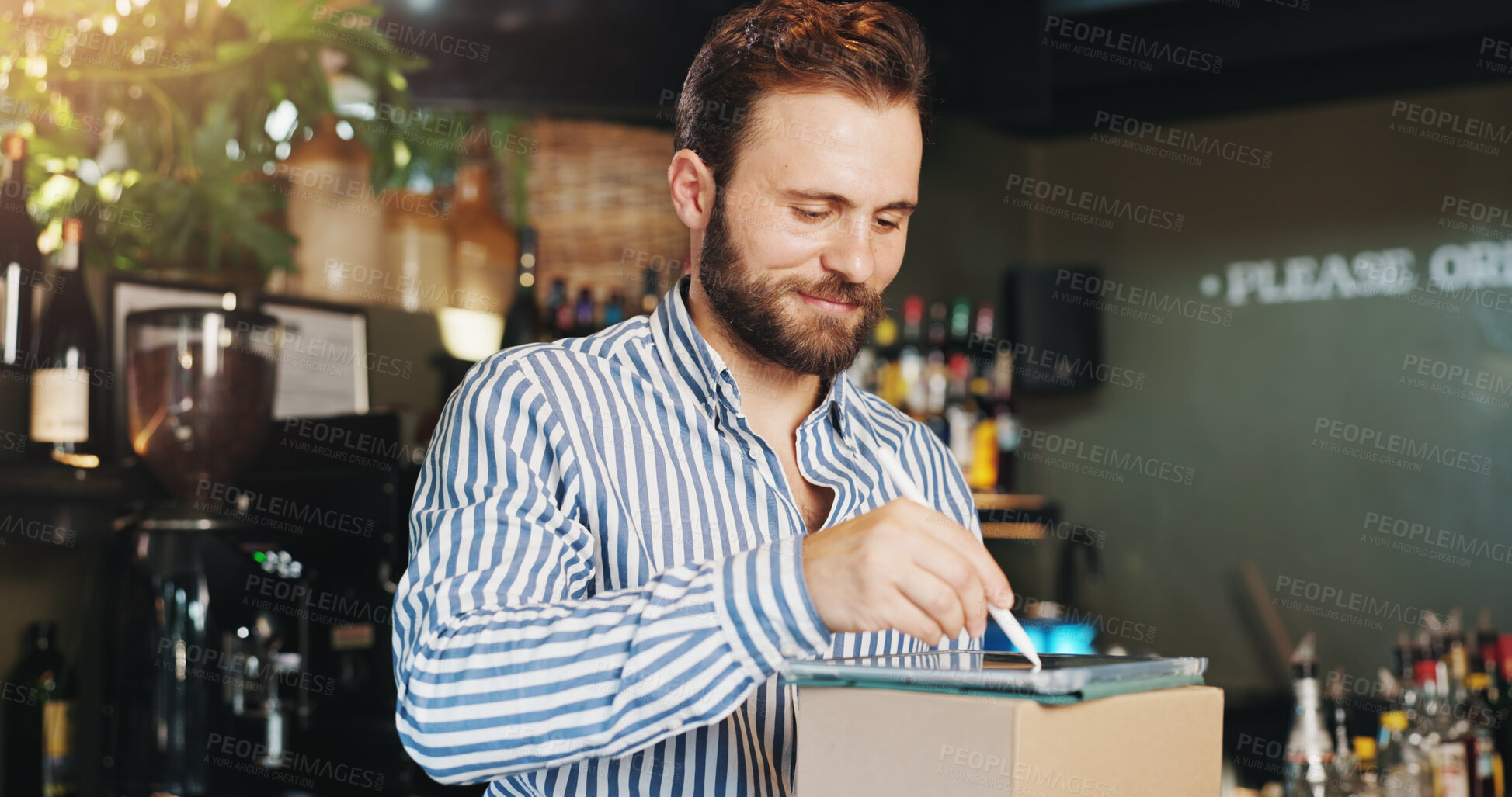 Buy stock photo Coffee shop, pen and man on tablet with boxes in cafe for menu items, inventory and online order. Restaurant, hospitality and business owner on digital tech for internet, pub planning and checklist