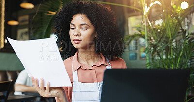 Buy stock photo Woman, laptop and paper in restaurant for small business, finance management or invoice payment. Cafe owner, technology or document for admin with stock order, inventory checklist and employee shifts