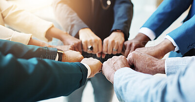 Buy stock photo Hands, fist bump and team of business people in circle for cooperation, trust or synergy for goal. Group, support and workers huddle together for community mission, solidarity or motivation in office
