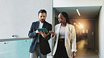 Business, people and walking with tablet for discussion of proposal feedback, investment analysis or meeting briefing. Financial analyst, teamwork and digital report for finance forecasting or review