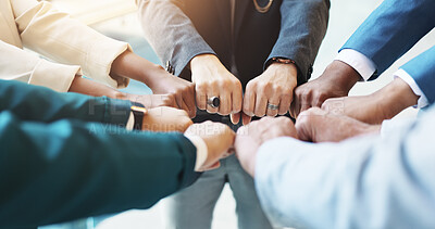 Buy stock photo Hands, fist bump and group of business people in circle for cooperation, trust or synergy for goal. Team, closeup and workers huddle together for community mission, solidarity or motivation in office